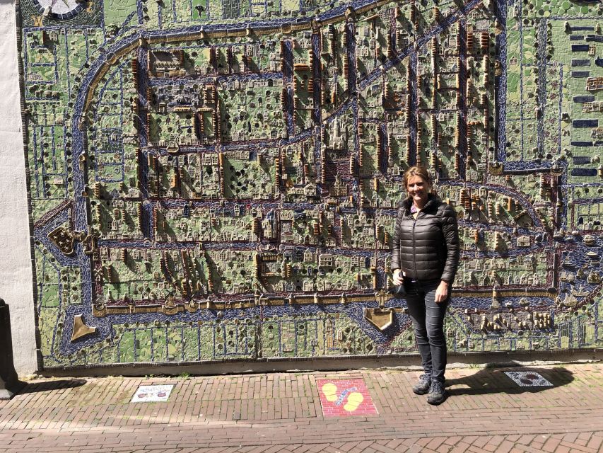 Delft: Private Historical and Cultural Guided Walking Tour - Town hall square, justice rooms, and Renaissance details