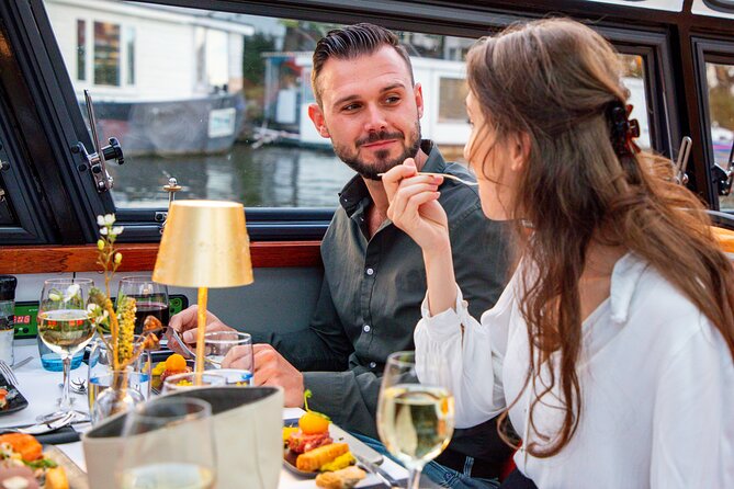 Dinner Canal Cruise Amsterdam: 4-Courses Including Drinks - The canal belt route: UNESCO waterways, Anne Frank House, and Westerkerk
