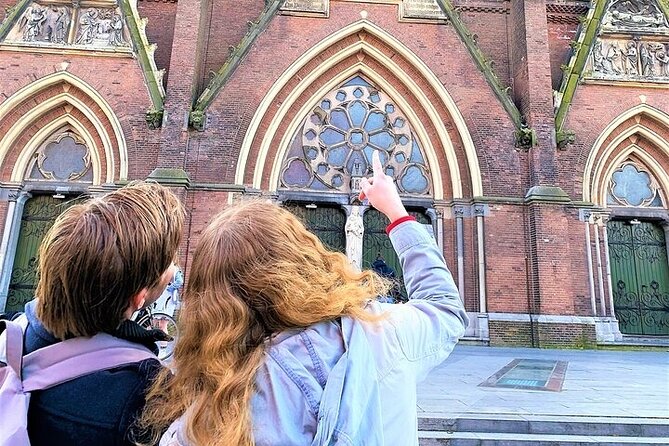 Discover Haarlem with a self-guided Outside Escape city game tour - Bakenessergracht and Bakenesserkerk: a calm canal opener with a white-tower payoff