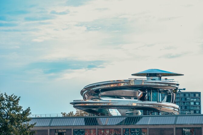 Discover Rotterdam: Classic Highlights Bike Tour with a Local - Veerhaven: seeing a shipping quarter and imagining older Rotterdam