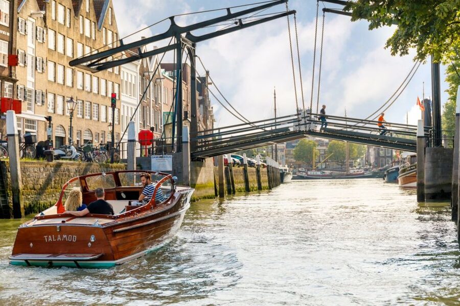 Dordrecht: City Walking Tour with Boat Ride - Three River Point: the payoff moment for canal-and-river fans
