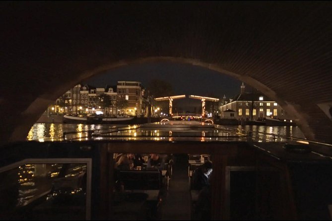 Evening Canal Cruise in Amsterdam with Wine & Cheese Option - Landmark spotting after sunset: Canal District scenes and Westerkerk