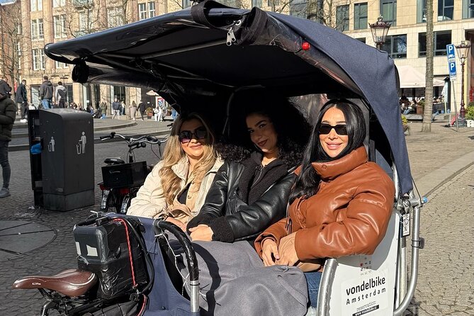 Explore Amsterdam in 75 Minutes – Pedicab Rickshaw City tour - Price and Value for Two People, Plus When Multiple Pedicabs Make Sense