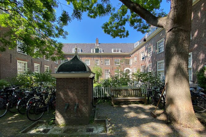 Explore hidden streets with friends - Private Tour - Entering Amsterdam through Beursplein, where commerce became culture