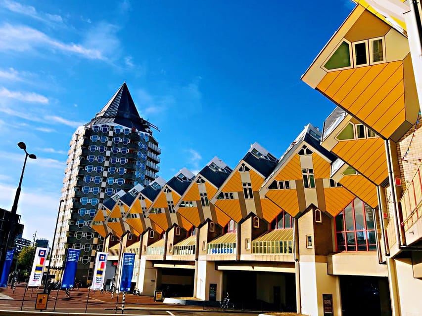 From Amsterdam: Day Tour to Rotterdam, Delft and The Hague - Rotterdam: seaport energy, Cube Houses, and WWII rebuilding lessons