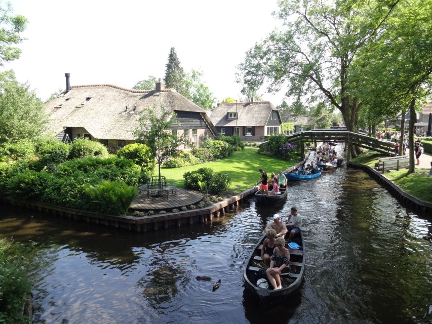 From Amsterdam: Giethoorn Day Trip with Small Electric Boat - Guided walking time: bridges, footpaths, and that postcard feeling