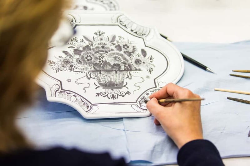 From Amsterdam: Rotterdam, Delft & The Hague Guided Day Tour - Delft Royal Delftware factory: where blue-and-white becomes real