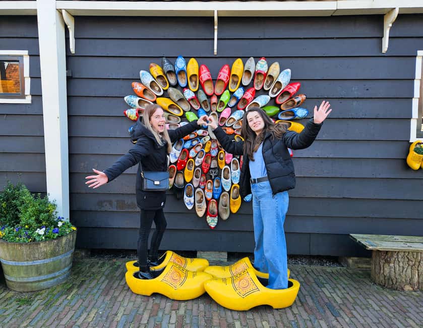 From Amsterdam: Volendam and Zaanse Schans Tour with Cheese - Volendam Guided Tour: Fishing Village Sights With Real Atmosphere
