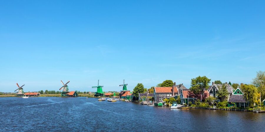 From Amsterdam: Windmills of Zaanse Schans Tour - Meeting at De Ruijterkade 153 and How the Coach Ride Fits In
