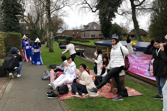 From Amsterdam: Zaanse Schans, Volendam, Giethoorn with Boat Tour - Volendam Haven: Harbor Stroll, Traditional Dress, and Photo Time