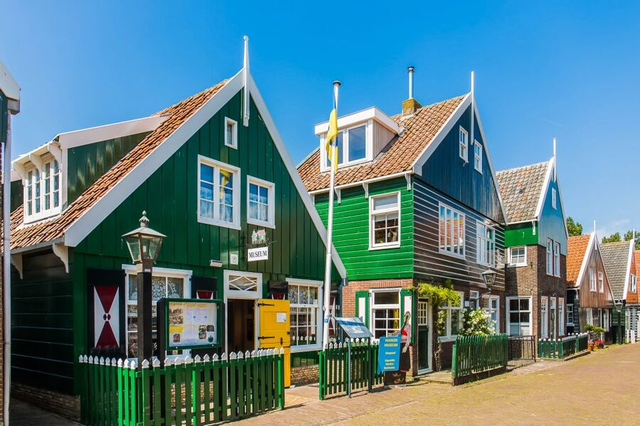 From Amsterdam: Zaanse Schans, Volendam & Marken Day Trip - Marken by Boat: The Gouwzee Crossing and Village Stroll