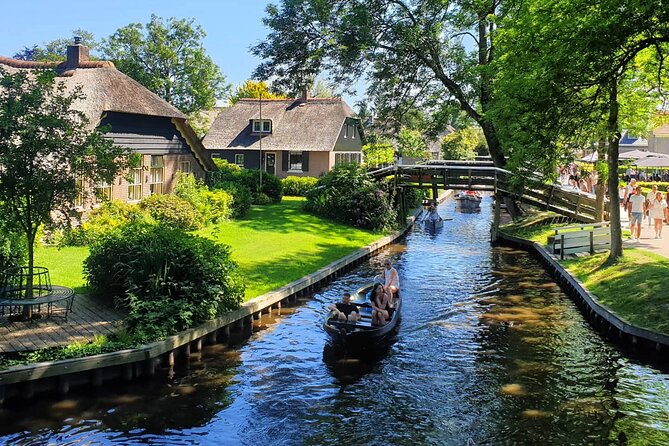 Giethoorn Day Tour from Amsterdam with Small Boat Ride - Giethoorn on foot, where the canals are your streets