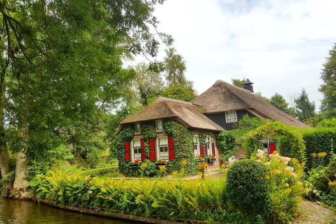 Giethoorn Guided DayTrip from Amsterdam - Giethoorn on your feet: bridges, thatched homes, and car-free calm