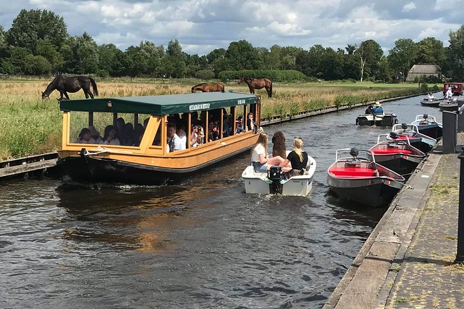 Giethoorn, Zaanse Schans Windmills Guided Day Trip from Amsterdam - Giethoorn by boat: how canals change the whole way you travel