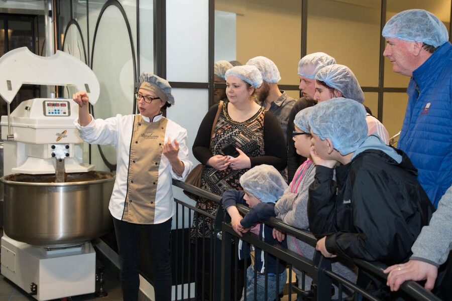 Gouda: Syrup Waffle Factory Ticket with a Waffle - A walk through the process, with bakers doing the work