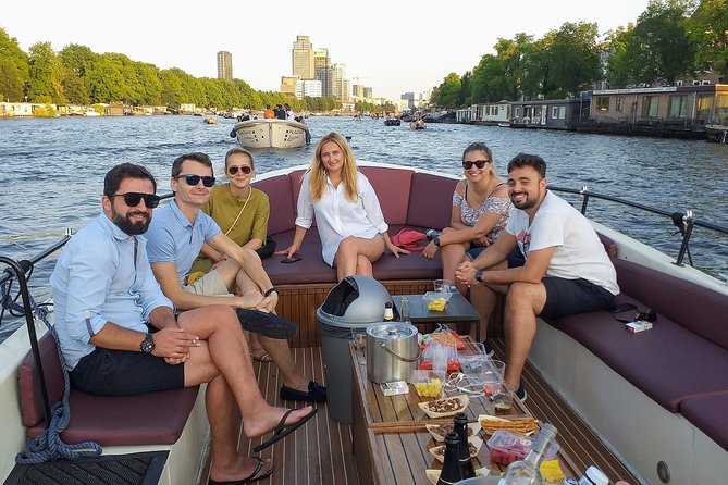 Guided Amsterdam Canal Cruise – Snacks & Drinks on board(1 Hour) - The route, stop by stop: what you’ll actually see on the water