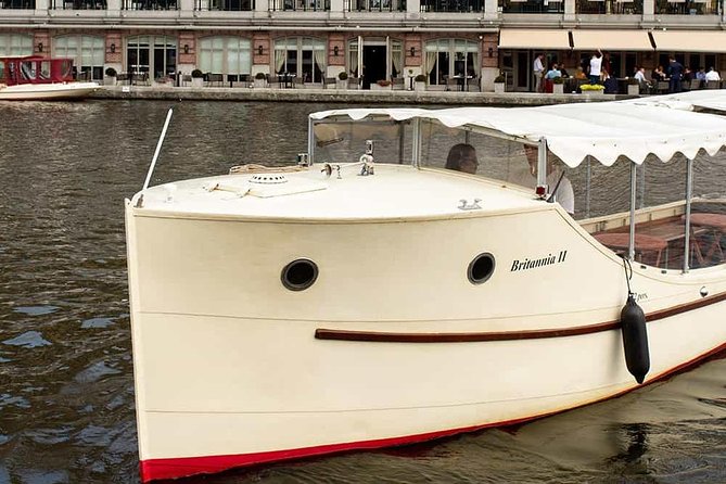 Guided Amsterdam Canal Cruise – Snacks & Drinks on board(1 Hour) - Drinks, snacks, and Real Dutch cheese: how to handle the onboard part