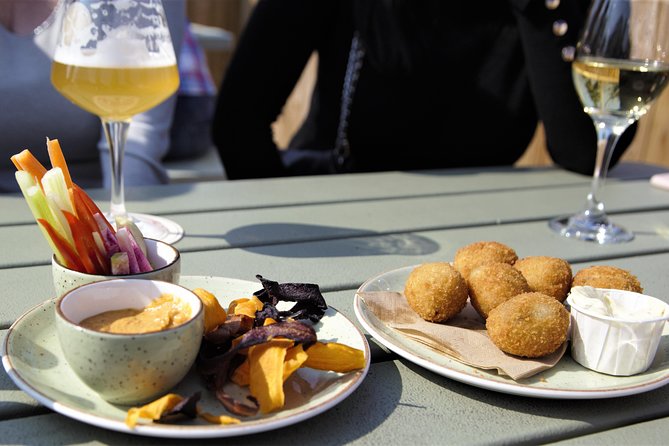 Guided Food Tour Haarlem (4-8 guests) - Old City - The food lineup: coffee, cheese, chocolate, beer, fries, and herring