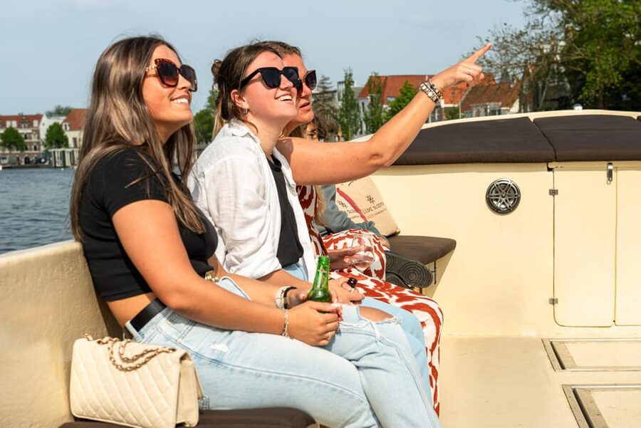 Haarlem: De Adriaan Windmill Tour + Open Canal Cruise - The electric open-boat canal cruise: quiet, open-air, and oddly relaxing