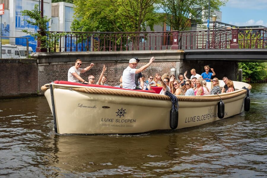 Haarlem: Guided Highlights Canal Cruise on Open Boat - The open electric boat: what quiet power changes for your trip