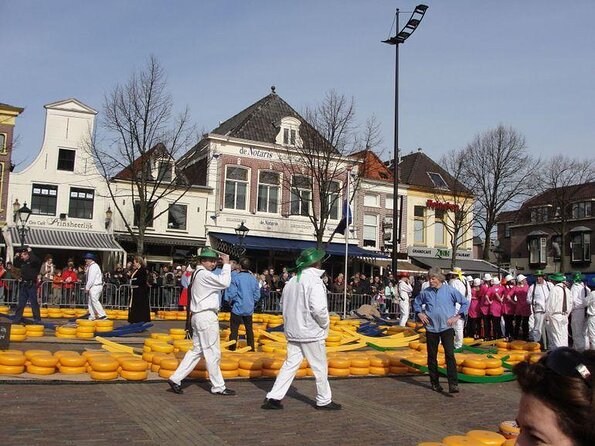 Half-Day Edam and Volendam Private Walking Tour from Amsterdam - Volendam city center: fishing-town streets, yachts, and local tasting ideas