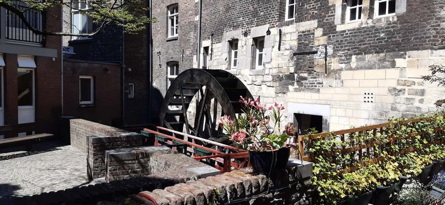 Historical Maastricht: Private Walking Tour with Local Guide - Mestreechter Geis: The Local Culture Layer You Might Miss Alone