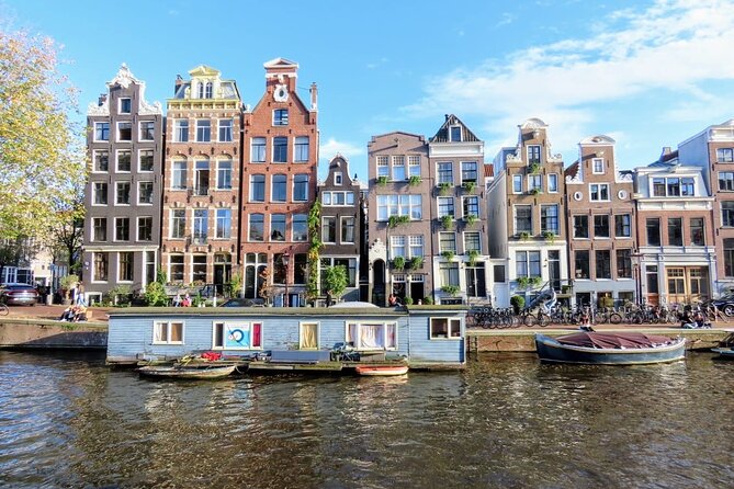 History & culture tour in Amsterdam with a local - Beursplein to Dam Square, from trade roots to wartime significance