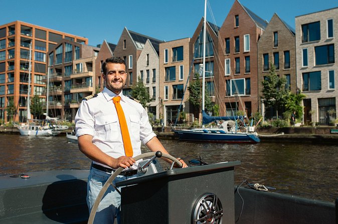Luxury Shared Canal Tour with live guide - St. Bavo Church: spire views, stained glass, and organ legends