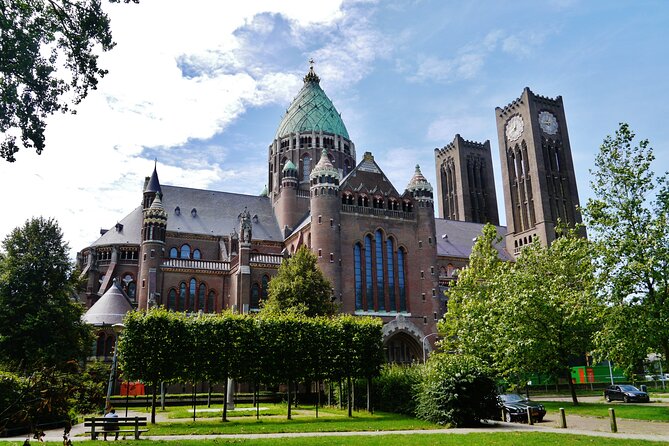 Luxury Shared Canal Tour with live guide - De Waag and the Old Courthouse: stepped gables and civic power
