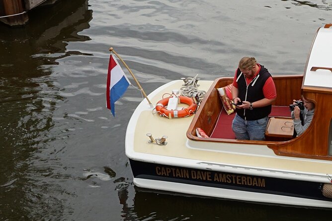 Morning Canal Cruise Amsterdam in Small-Group - The 1928 saloon boat: dry seating, warm air, and real comfort