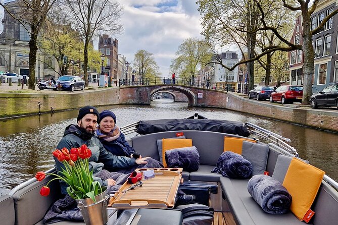 Private 90 Minute Amsterdam Canal Belt Exploration Cruise - Flower market from the water: floating stalls in motion