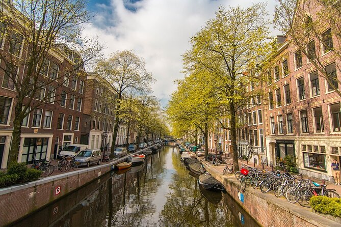Private Amsterdam City Highlights Bike Tour (PRIVATE GUIDE) - Safety and pace: the big deal in a bike tour