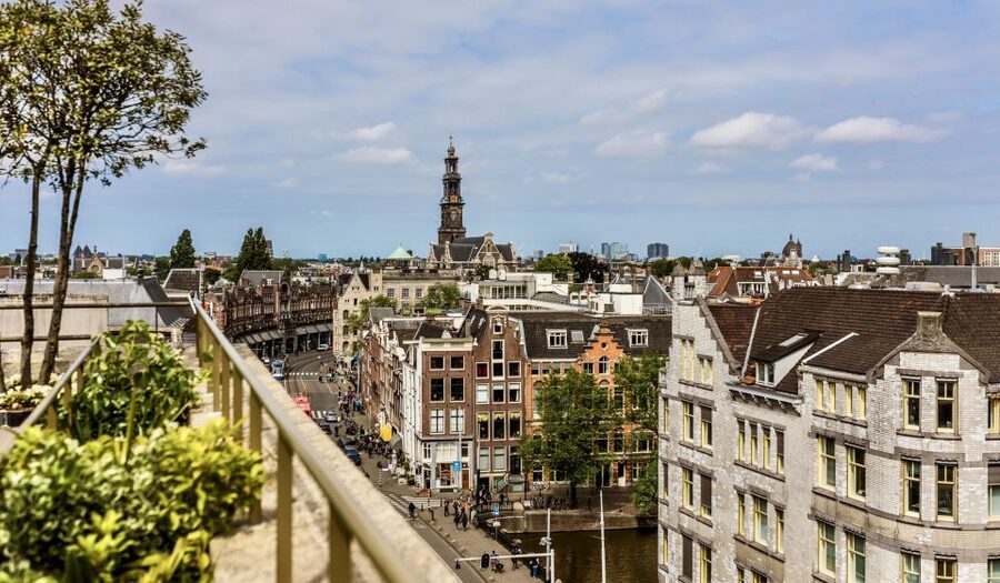 Private Amsterdam Tour with a Local, Flexible & Custom - Bloemenmarkt floating flower market: a sensory pause on the canals