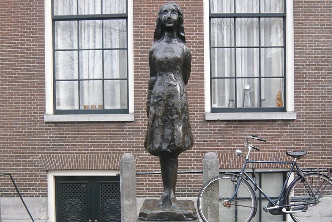 Private Amsterdam WW2 walking tour - Dam Square and the Royal Palace finish: Amsterdam beyond the monuments