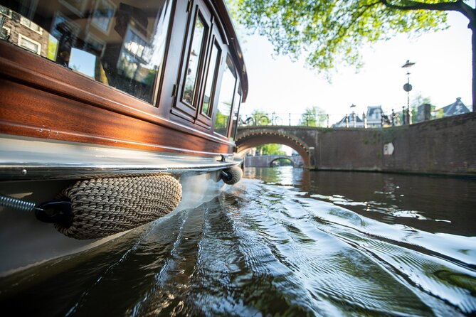 Private Boat Tour Amsterdam - 90 Min incl. welcome drink on historic saloon boat - Comfort, Warmth, and What to Bring for a Cozy Ride