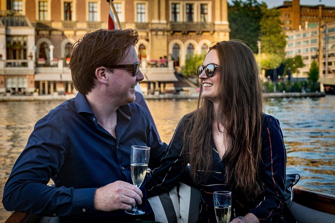 Private Boat Tour Amsterdam - 90 Min incl. welcome drink on historic saloon boat - The 90-Minute Canal Route, Set Around Your Interests