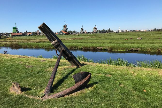 Private Excursion to Zaanse Schans, Edam, Volendam and Marken - Volendam harbor: fish lunch, waterfront views, and dike stories
