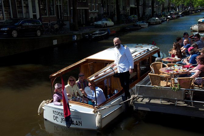 Private Guided Historic Amsterdam Canal Cruise in a Salon Boat - Price and what it really buys you: time, access, and control