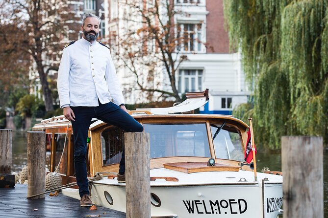 Private Guided Historic Amsterdam Canal Cruise in a Salon Boat - The guide experience: lively when you want it