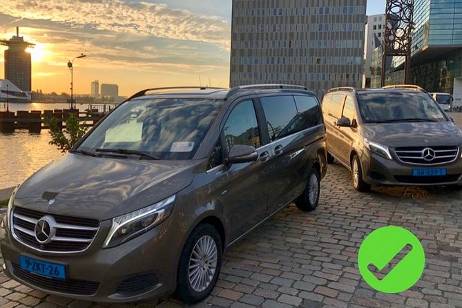Private transfers from or to Schiphol (AMS) airport Amsterdam - Your driver at Schiphol main hall: sign, timing, and clear directions