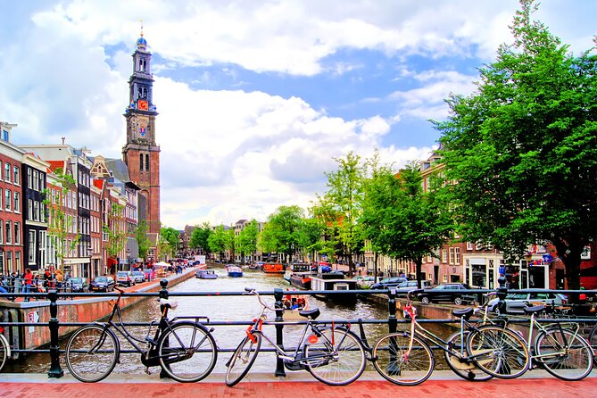 Private walking tour Amsterdam. English or Spanish. - Tower of the Coin, the Flower Market Route, and the Floating Market of Flowers