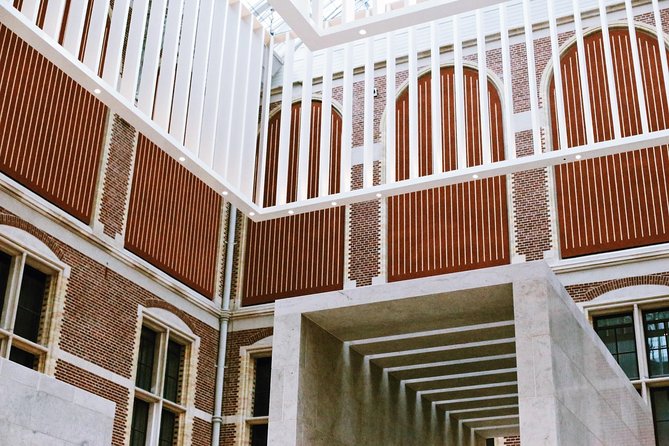 Rijksmuseum & Amsterdam City Center - Exclusive Guided Tour - Churches, civic buildings, and the Stopera landmark
