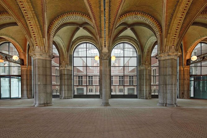 Rijksmuseum Amsterdam Semi-Private Guided Tour - Meeting point at Rijksmuseum: find the orange school sign