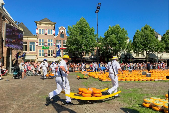 Small Group Alkmaar Cheese Market and City Tour <em>English</em> – Key things to know before you go’ /></p>
<ul>
<li><strong>Small group (max 6)</strong> means more attention and a better chance to see what is happening</li>
<li><strong>Prime market viewing</strong> helps you watch the trading and weighing without craning constantly</li>
<li><strong>A real trading explanation</strong> so you understand the Weigh House and why it matters</li>
<li><strong>Cheese carrier tradition</strong> adds energy, plus you may get brief interactions up close</li>
<li><strong>Cheese tasting and shopping options</strong> (extra cost for purchases)</li>
<li><strong>Cobbled medieval streets and canals</strong> make the city walk feel like more than just a detour</li>
</ul>
<h2 id="a-small-group-morning-built-around-the-alkmaar-cheese-market">A small-group morning built around the Alkmaar Cheese Market</h2>
<p><img width="669" height="446" decoding="async" src=