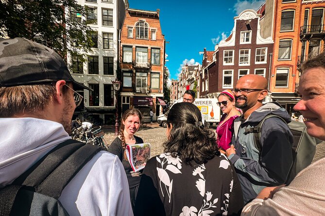 Small Group Walking Tour - Hello Amsterdam - Haarlemmersluis: Canal Belt Gateway and the Bike Culture Story