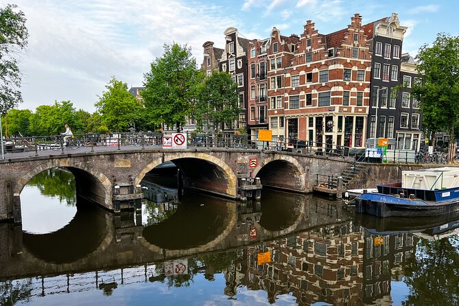 Small Group Walking Tour in Amsterdam with Friendly and Fun Guide - Iconic canals and the 17th-century story: where Amsterdam became Amsterdam