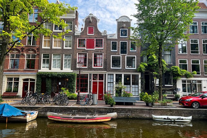 Small Group Walking Tour in Amsterdam with Friendly and Fun Guide - Old Center from Waag to Dam Square: layered streets and story turns