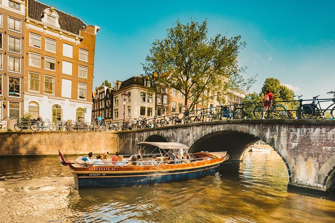 The Ultimate Amsterdam Canal Cruise - 2hr - Small Group with Drinks & Snacks - The guide and captain story: history with personality