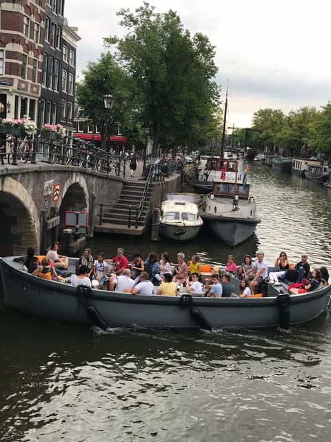 Visit Amsterdam by Boat with a French Guide (french) - Light Festival Season, and Why Winter Can Be a Good Time