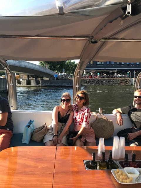 Visit Amsterdam by Boat with a French Guide (french) - Price and Value: What You Get for About $41